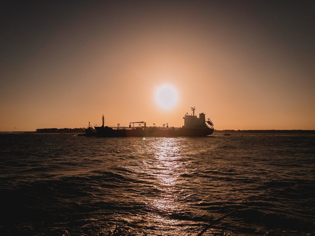 Photo of oil tanker off South America, sunset